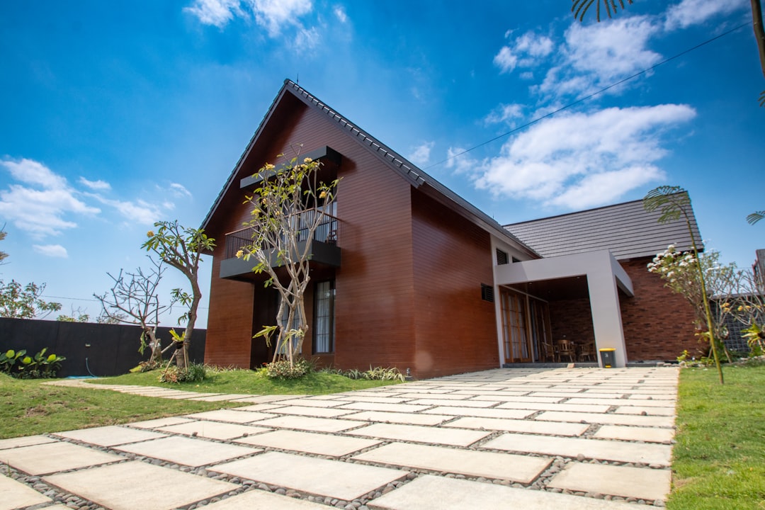 Modern home exterior with a tiled driveway, illustrating an outdoor parking tile application